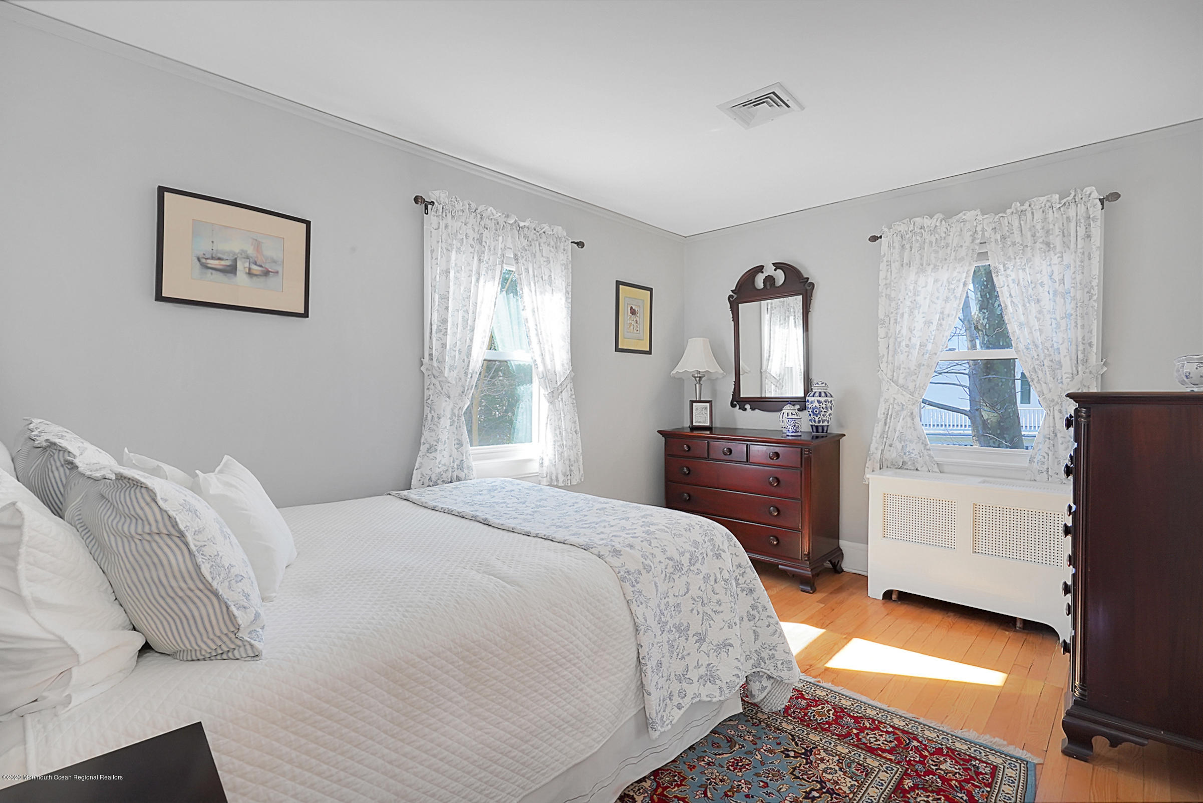 5 Garden Road Little Silver, NJ 07739 - Photo 14 of 34 a bedroom with a bed and a view of bathroom