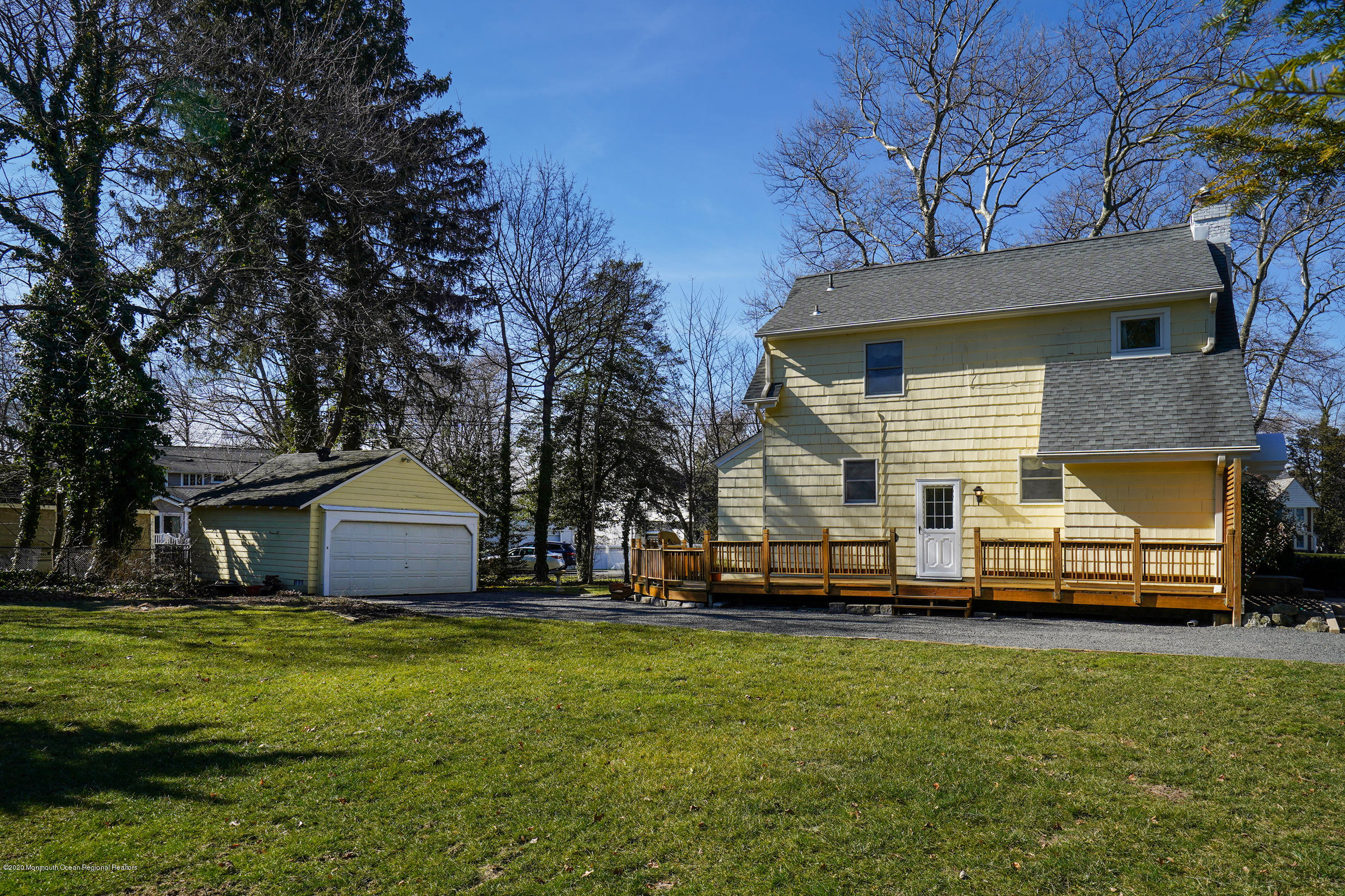 5 Garden Road Little Silver, NJ 07739 - Photo 22 of 34 a front view of a house with a garden