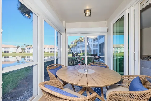 a outdoor dining space with furniture and outdoor view