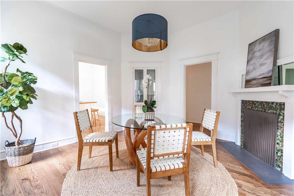 680 Grady Place Southwest Atlanta, GA 30310 - Photo 14 of 54 a dining room with furniture and a potted plant