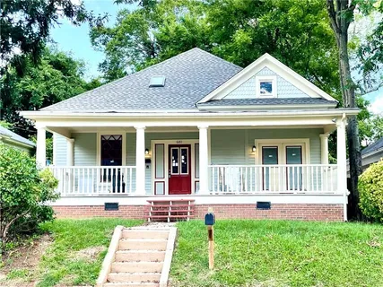 a view of front door of house with a window