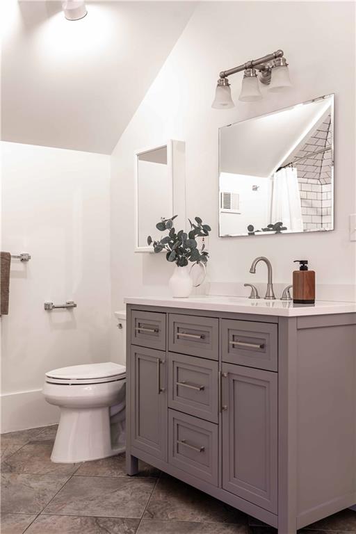 680 Grady Place Southwest Atlanta, GA 30310 - Photo 41 of 54 a bathroom with a granite countertop sink and a toilet