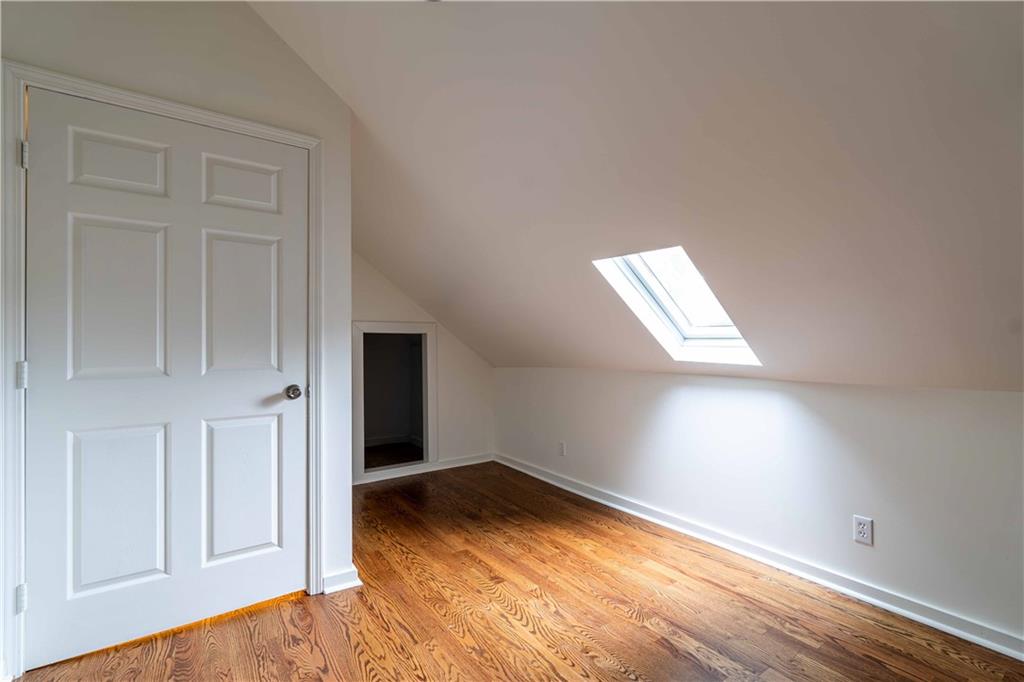 680 Grady Place Southwest Atlanta, GA 30310 - Photo 46 of 54 an empty room with wooden floor and closet