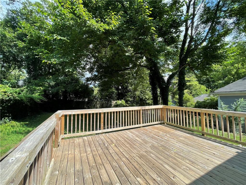 680 Grady Place Southwest Atlanta, GA 30310 - Photo 53 of 54 a view of deck with wooden floor and outdoor seating