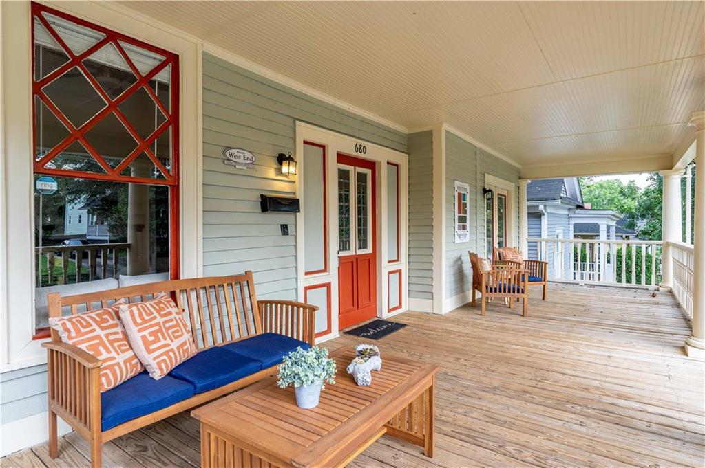 680 Grady Place Southwest Atlanta, GA 30310 - Photo 6 of 54 a view of a deck with wooden floor and furniture