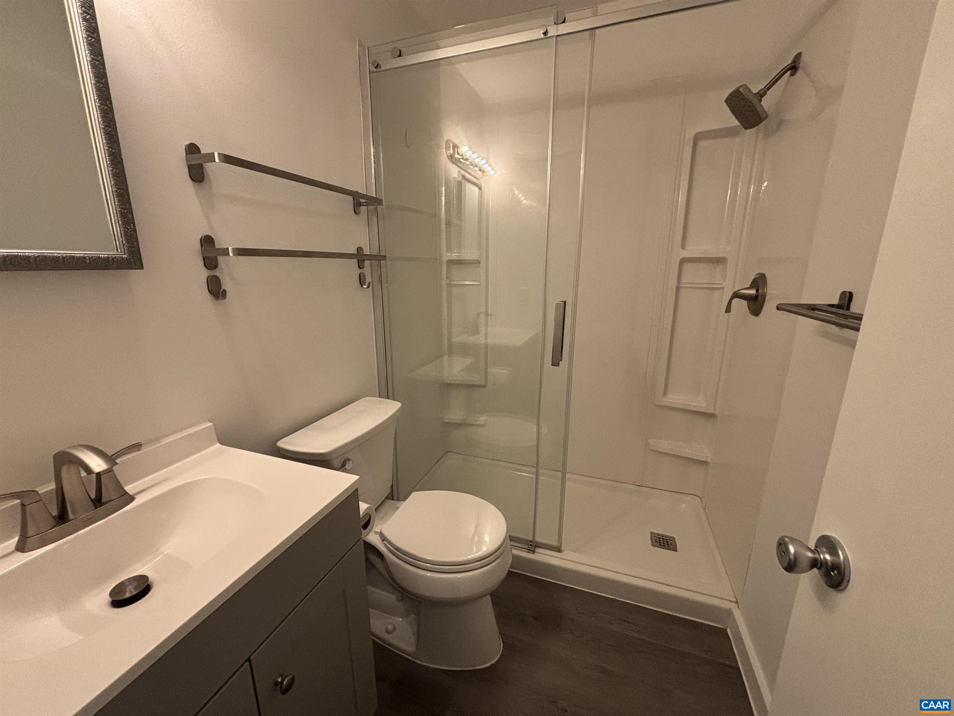 988 Salisbury Square Charlottesville, VA 22901 - Photo 12 of 17 a bathroom with a sink a toilet and shower