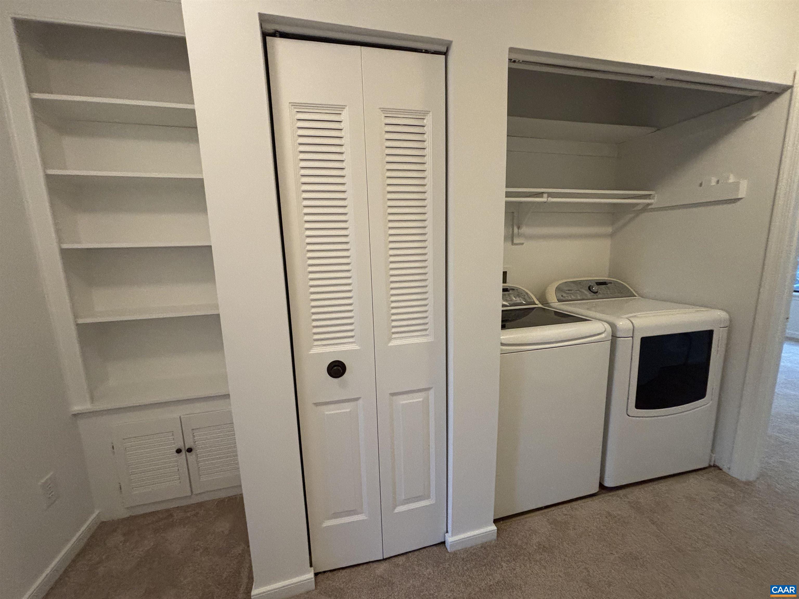 988 Salisbury Square Charlottesville, VA 22901 - Photo 16 of 17 a utility room with dryer and washer