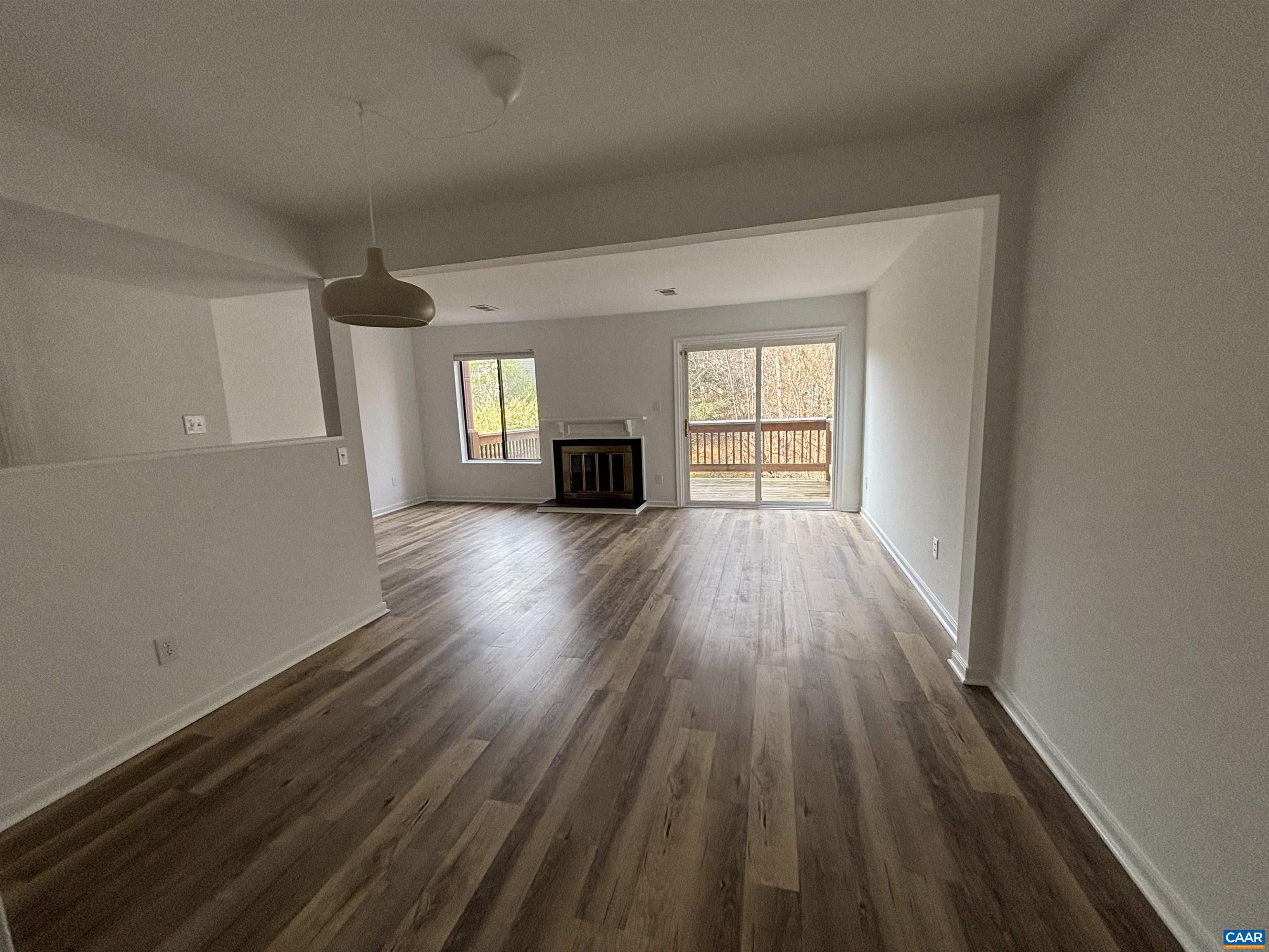 988 Salisbury Square Charlottesville, VA 22901 - Photo 5 of 17 wooden floor in an empty room with a window