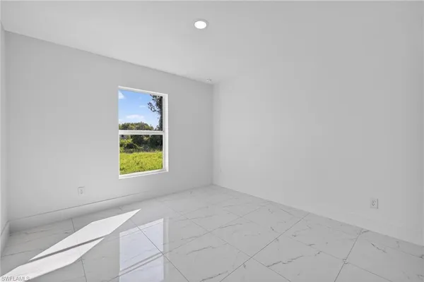 an empty room with a window