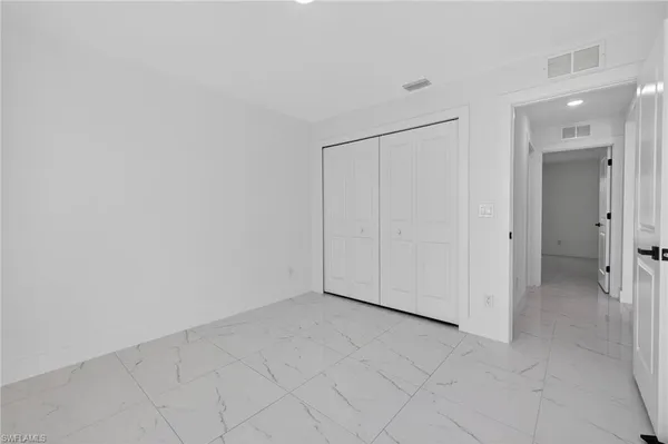 an empty room with a natural light