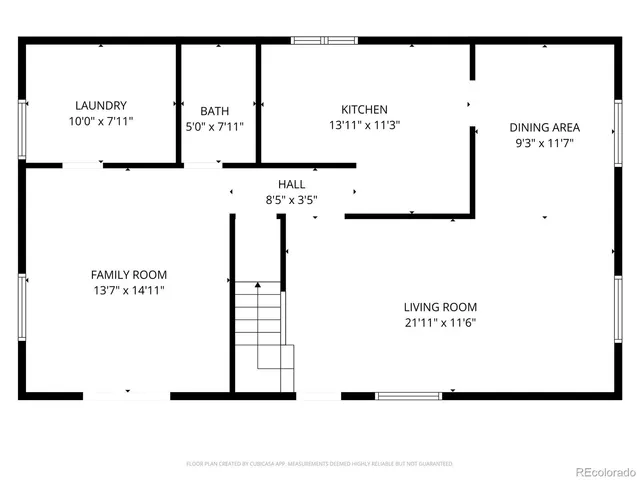 a bed in a bedroom next to a window