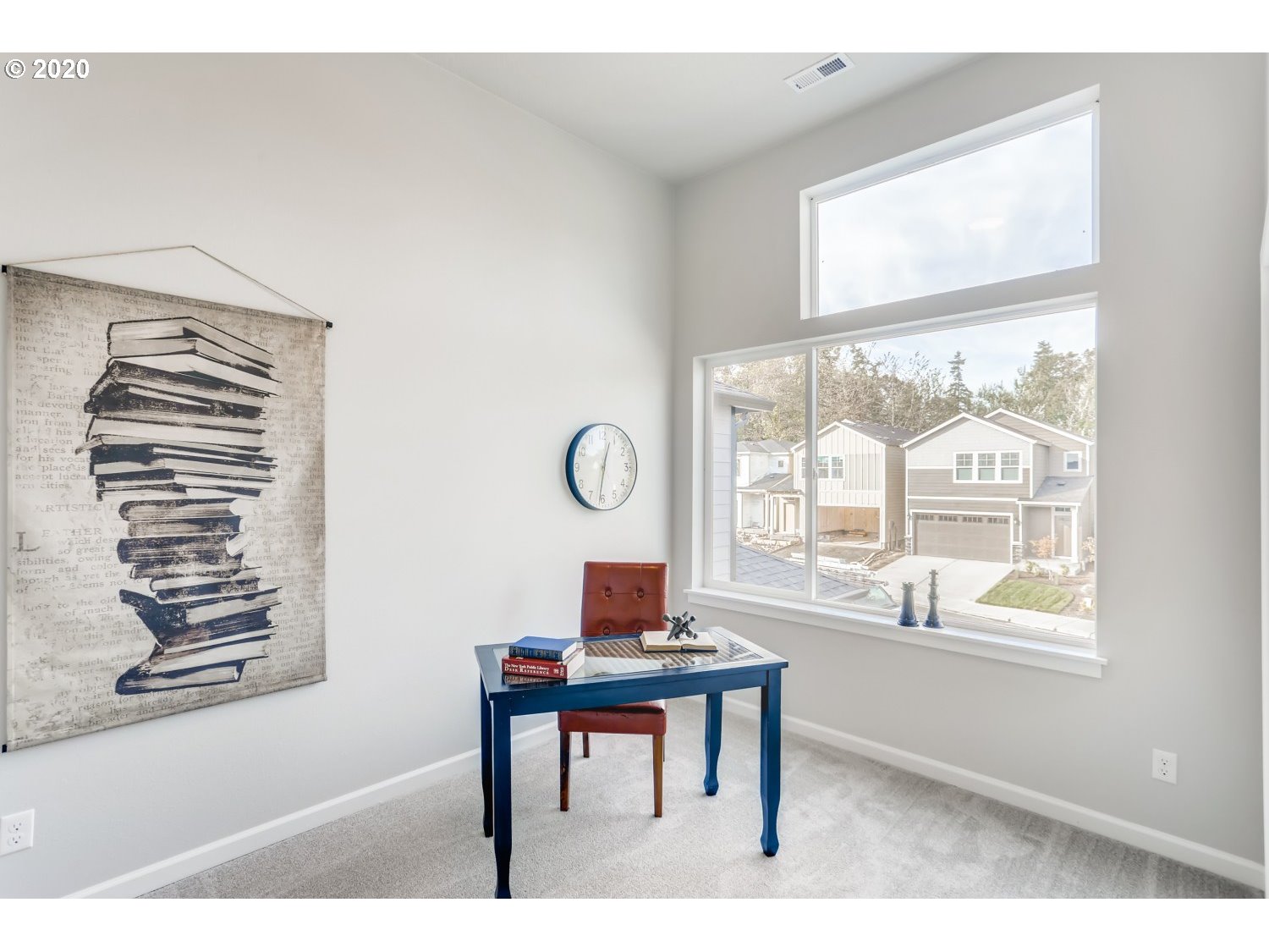 1550 19th Avenue Forest Grove, OR 97116 - Photo 18 of 26 a living room with furniture a window and a flat screen tv