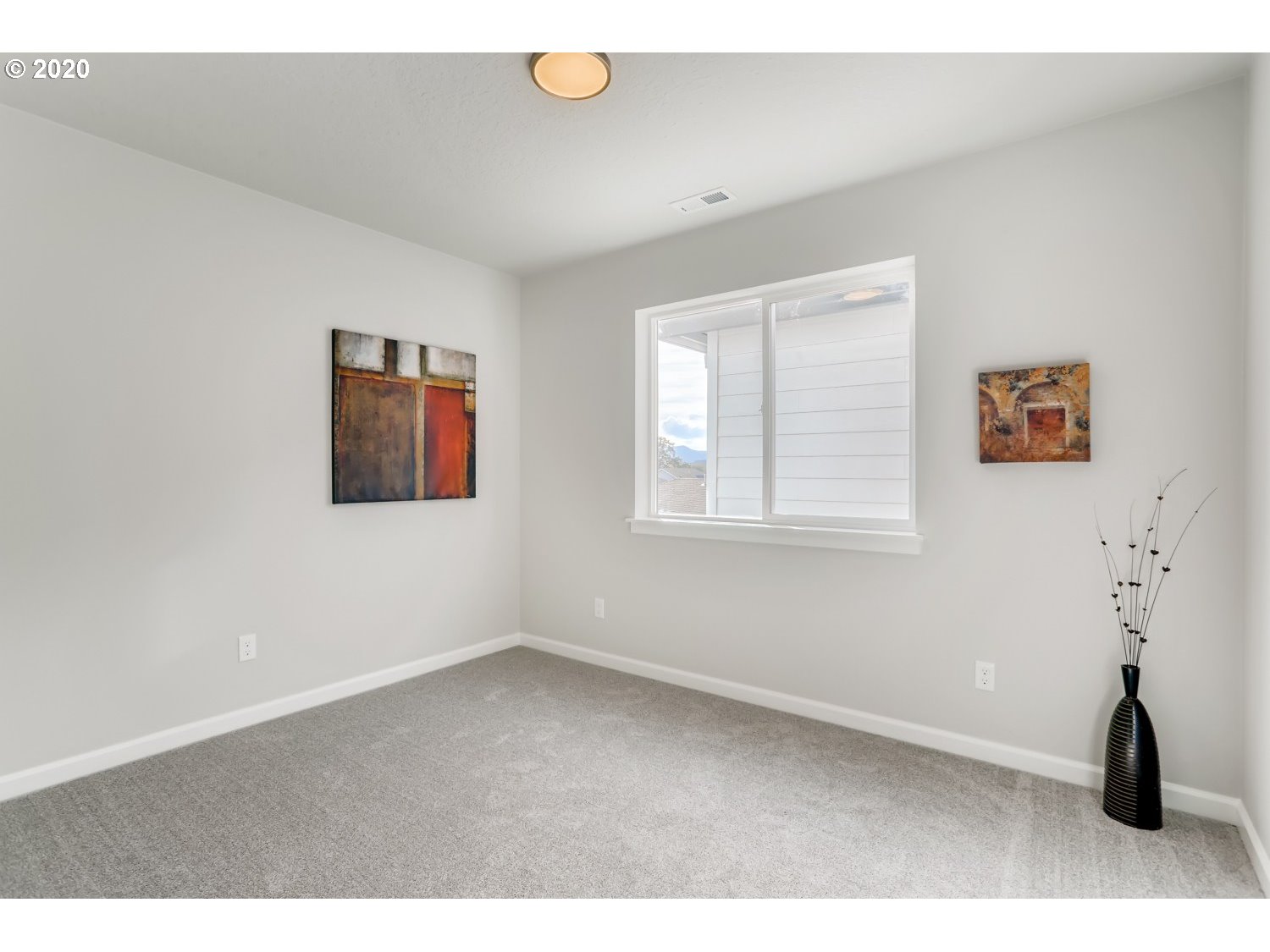 1550 19th Avenue Forest Grove, OR 97116 - Photo 21 of 26 a view of an empty room with windows