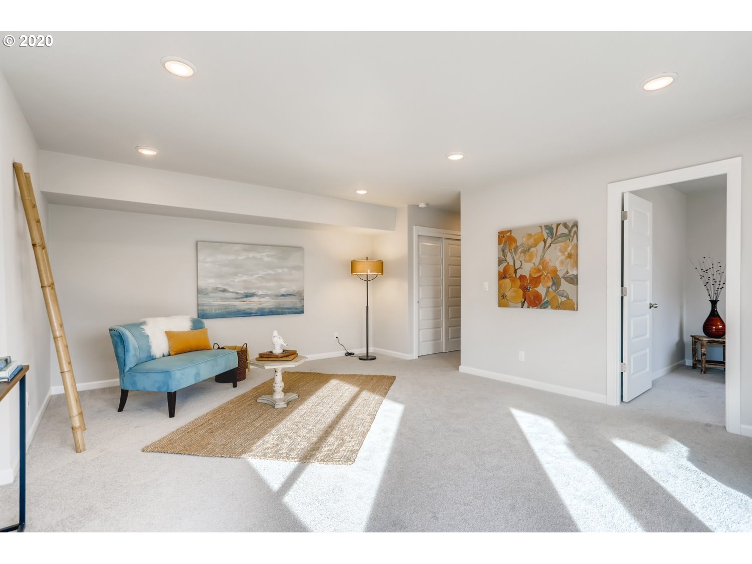 1550 19th Avenue Forest Grove, OR 97116 - Photo 24 of 26 a living room with furniture and a rug