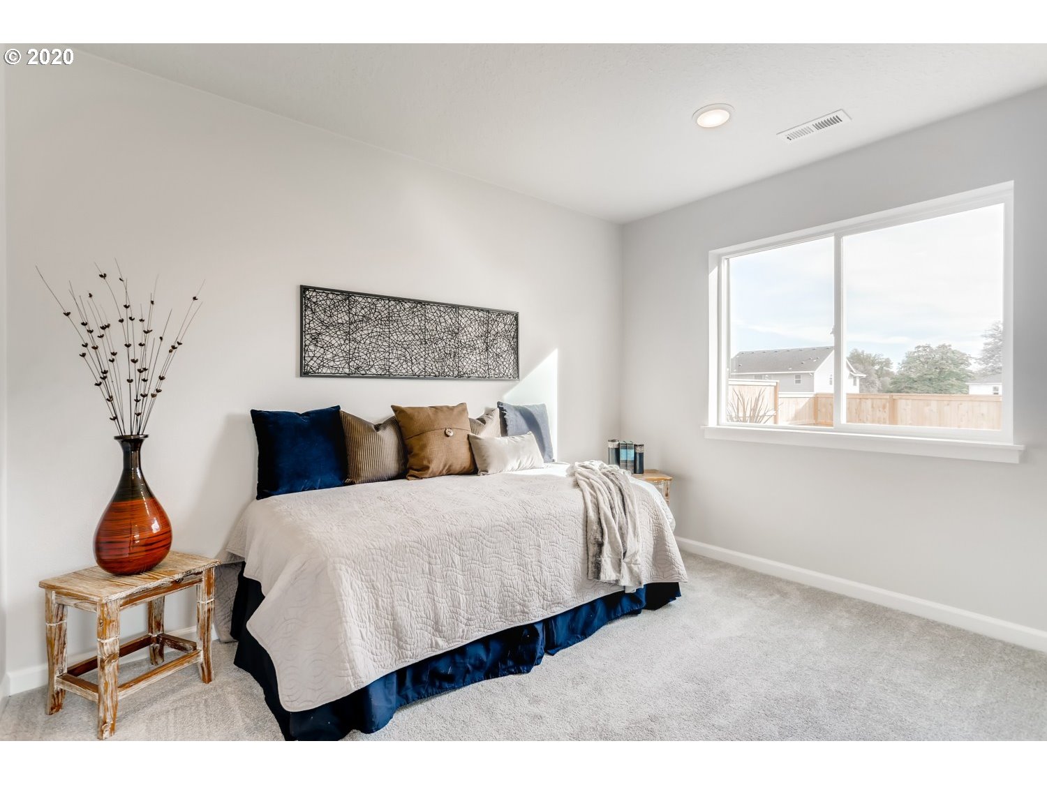 1550 19th Avenue Forest Grove, OR 97116 - Photo 25 of 26 a bedroom with a bed and window