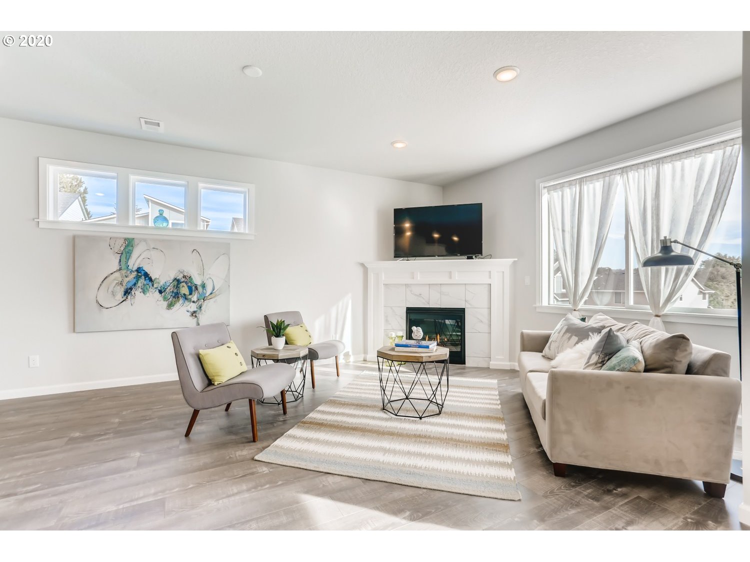 1550 19th Avenue Forest Grove, OR 97116 - Photo 6 of 26 a living room with furniture and a fireplace