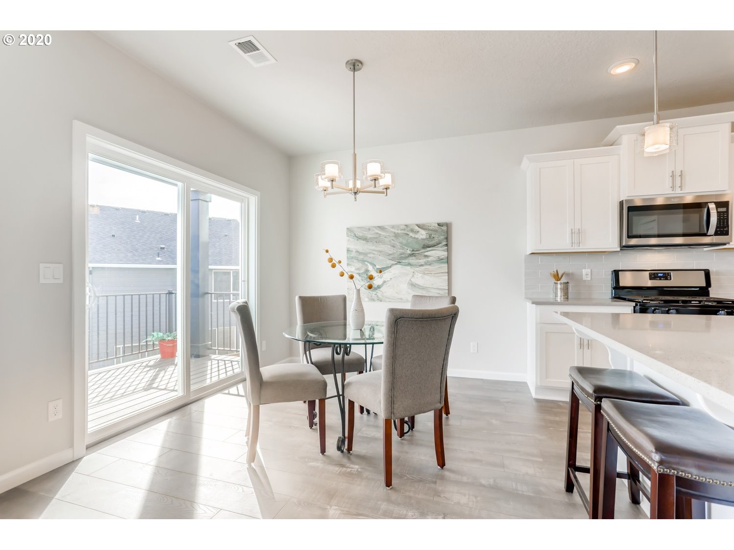 1550 19th Avenue Forest Grove, OR 97116 - Photo 9 of 26 a view of a dining room with furniture window and wooden floor