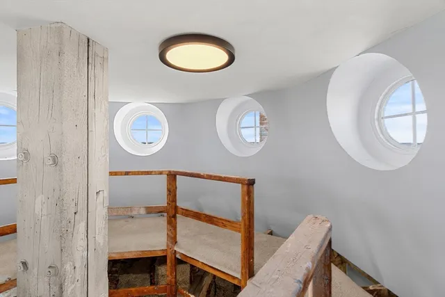 an aerial view of a house with outdoor space