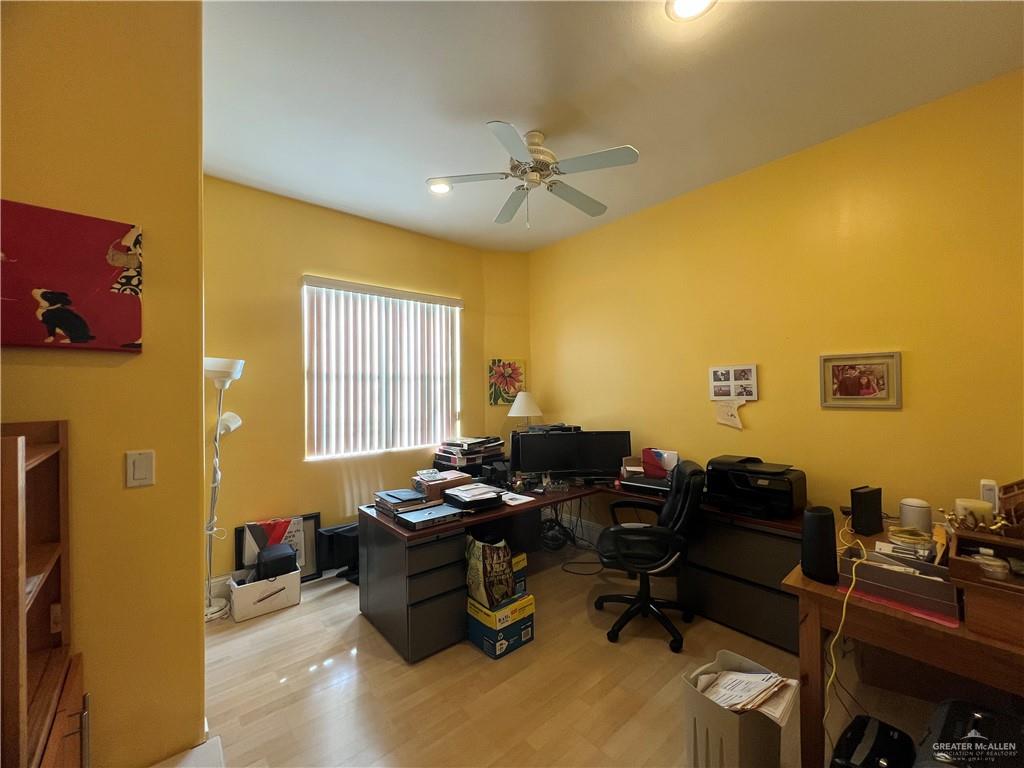 416 Frio Street Mission, TX 78572 - Photo 20 of 35 a room with furniture and a window