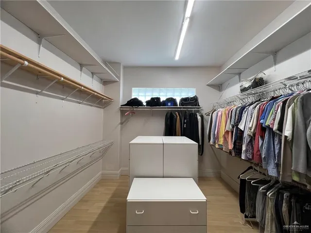 a view of a lake with a bench in front of it