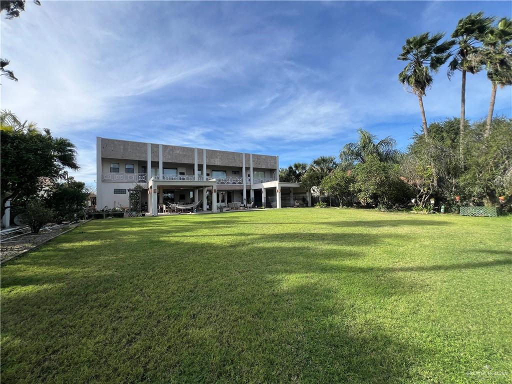 416 Frio Street Mission, TX 78572 - Photo 34 of 35 a view of a house with a big yard