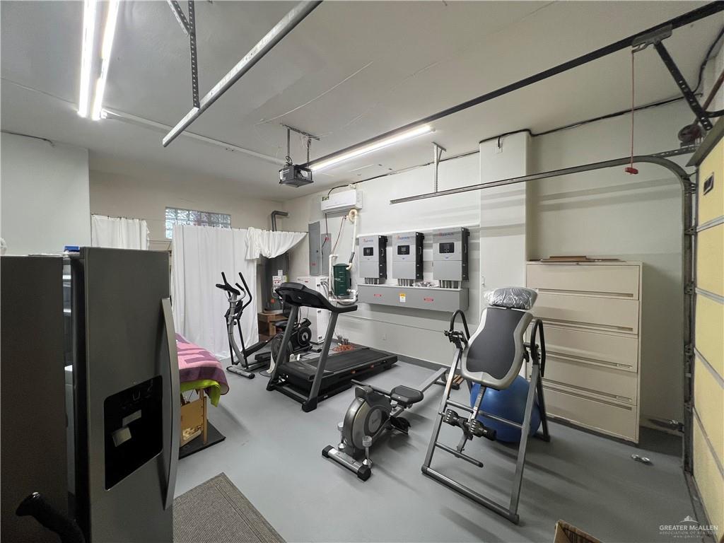 416 Frio Street Mission, TX 78572 - Photo 5 of 35 a view of a room with gym equipment