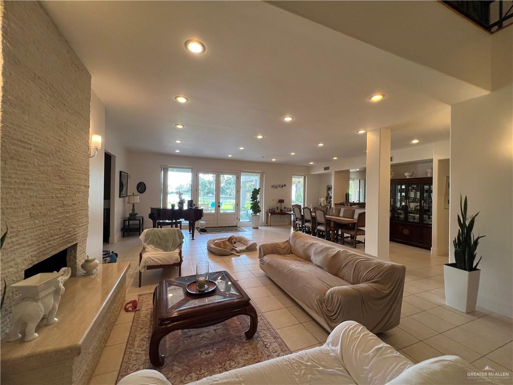 416 Frio Street Mission, TX 78572 - Photo 6 of 35 a living room with furniture kitchen view and a large window