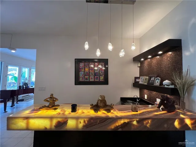 a view of a swimming pool with seating area