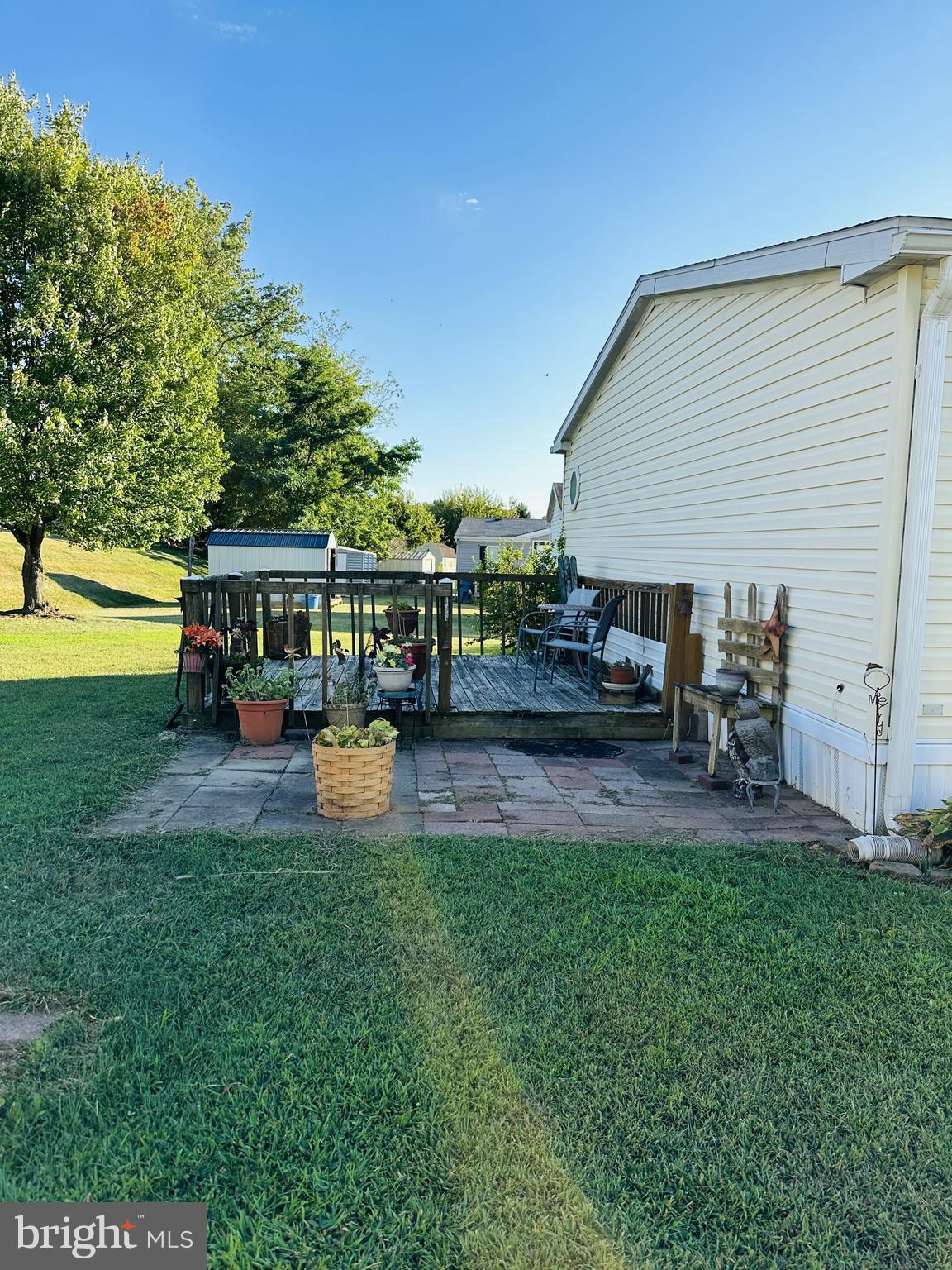 16935 Alcott Road Hagerstown, MD 21740 - Photo 3 of 9 a view of a house with backyard and sitting area