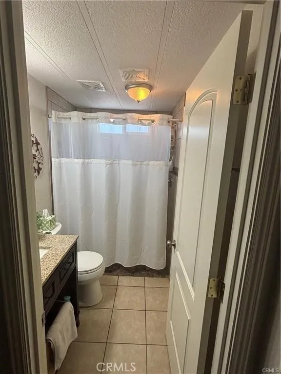 670 Channel Needles, CA 92363 - Photo 11 of 19 a bathroom with a sink toilet and shower