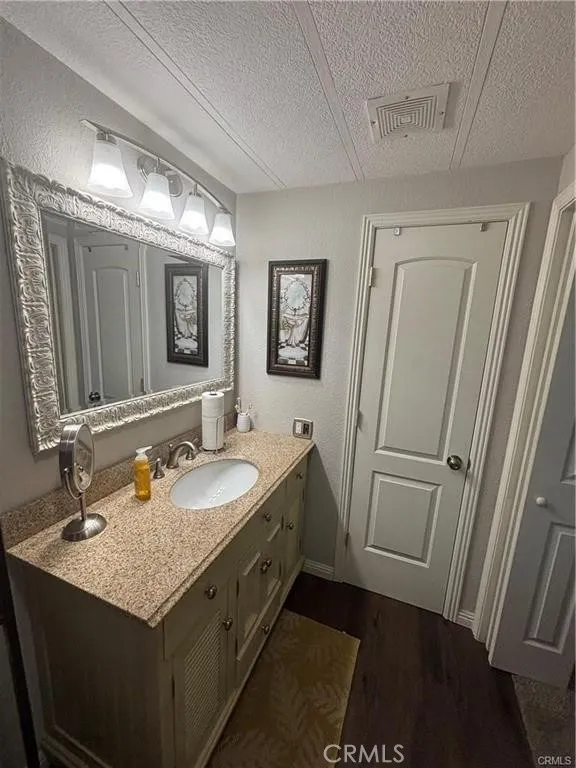 670 Channel Needles, CA 92363 - Photo 8 of 19 a bathroom with a sink and a mirror