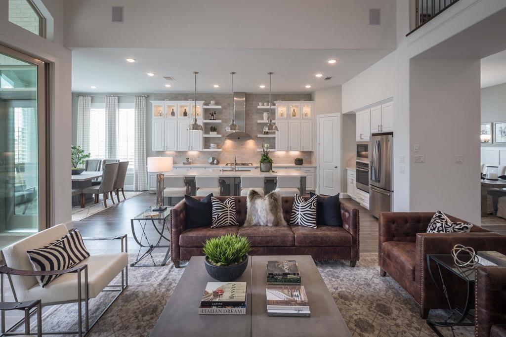 931 Fallkirk Drive Prosper, TX 75078 - Photo 7 of 7 a living room with furniture kitchen and a table