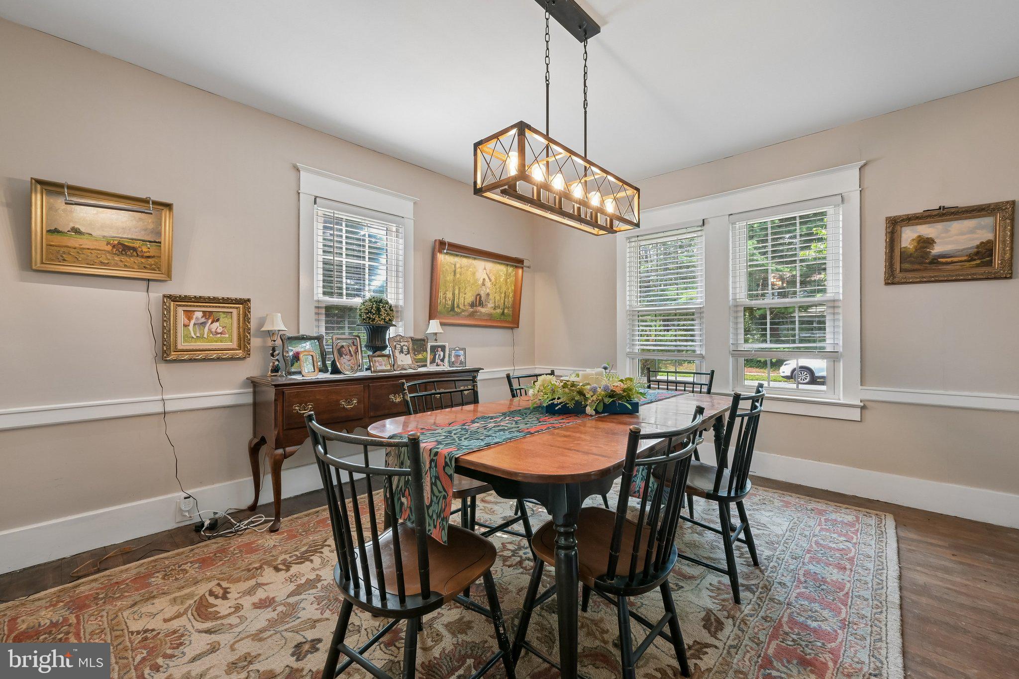 121 Villanova Road Glassboro, NJ 08028 - Photo 9 of 31 a view of a dining room with furniture window and wooden floor