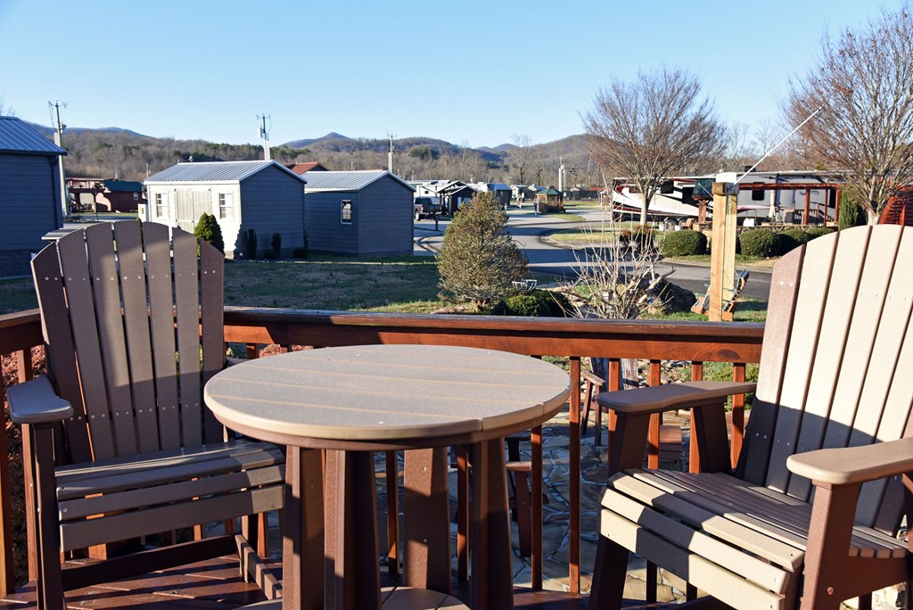 52 Foggy Mountain Road Blairsville, GA 30512 - Photo 26 of 50 a view of a chairs and table in patio