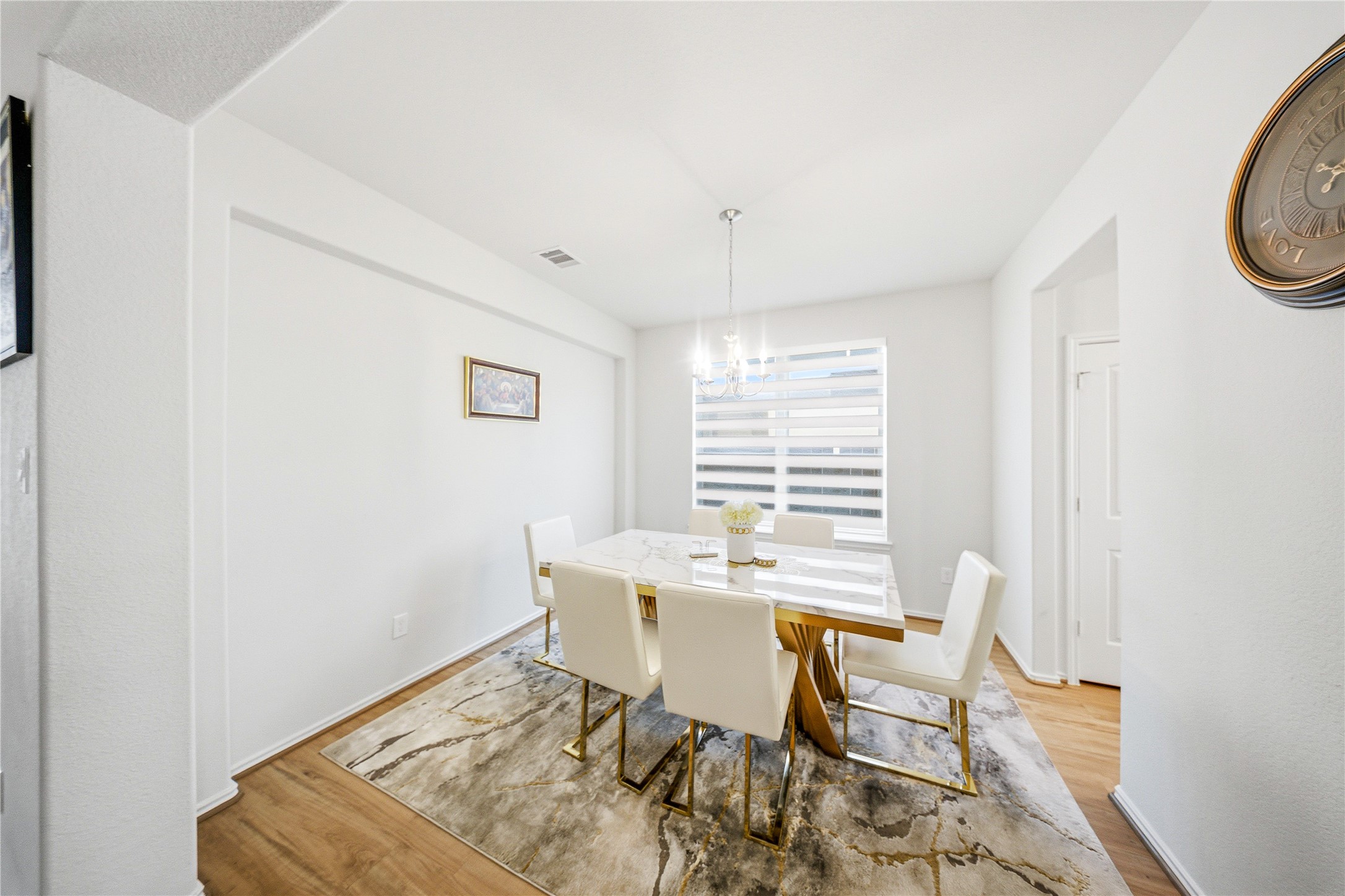 1622 Homewood Point Lane Rosharon, TX 77583 - Photo 11 of 41 a view of a dining room with furniture and a window