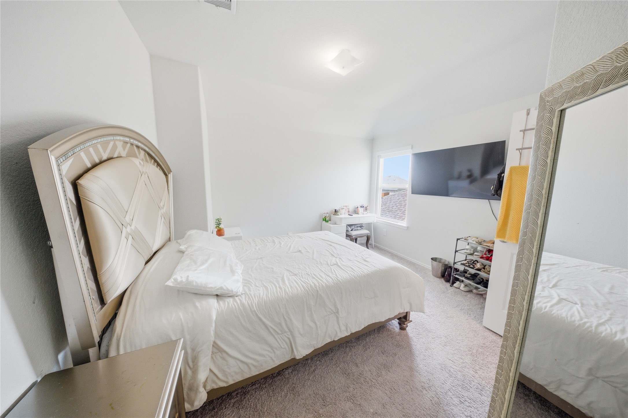 1622 Homewood Point Lane Rosharon, TX 77583 - Photo 16 of 41 a bedroom with bed and a potted plant