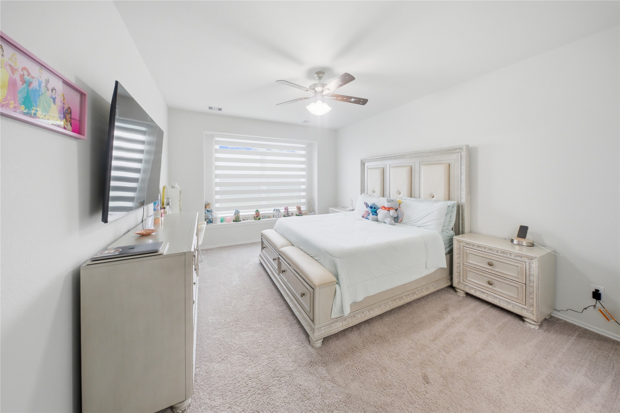 1622 Homewood Point Lane Rosharon, TX 77583 - Photo 24 of 41 a en suite bedroom with a bed and a dresser