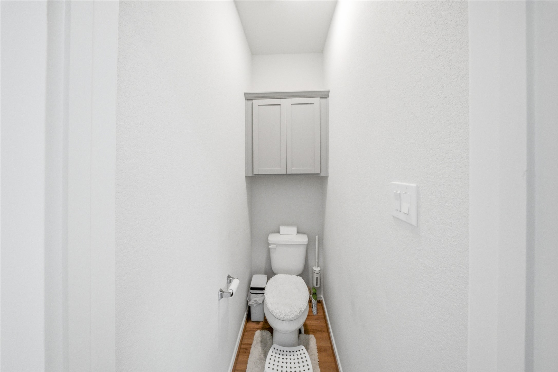 1622 Homewood Point Lane Rosharon, TX 77583 - Photo 27 of 41 a bathroom with a toilet and a sink