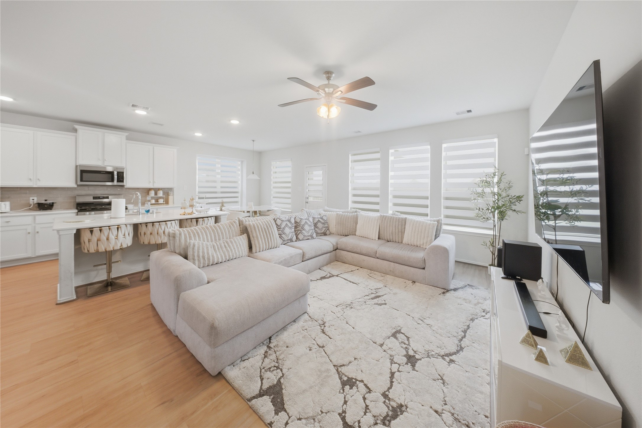 1622 Homewood Point Lane Rosharon, TX 77583 - Photo 7 of 41 a living room with furniture and a flat screen tv