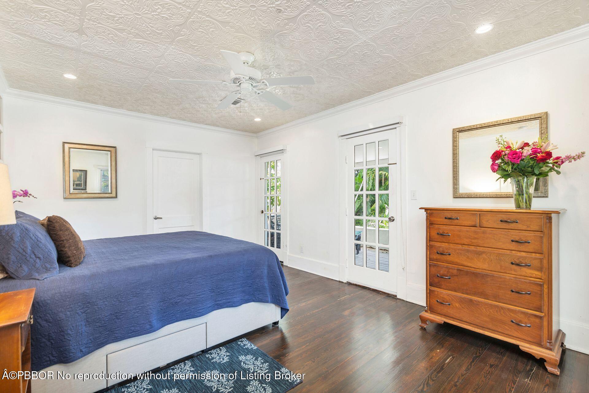 4112 Washington Road West Palm Beach, FL 33405 - Photo 16 of 41 a bedroom with a bed and a dresser