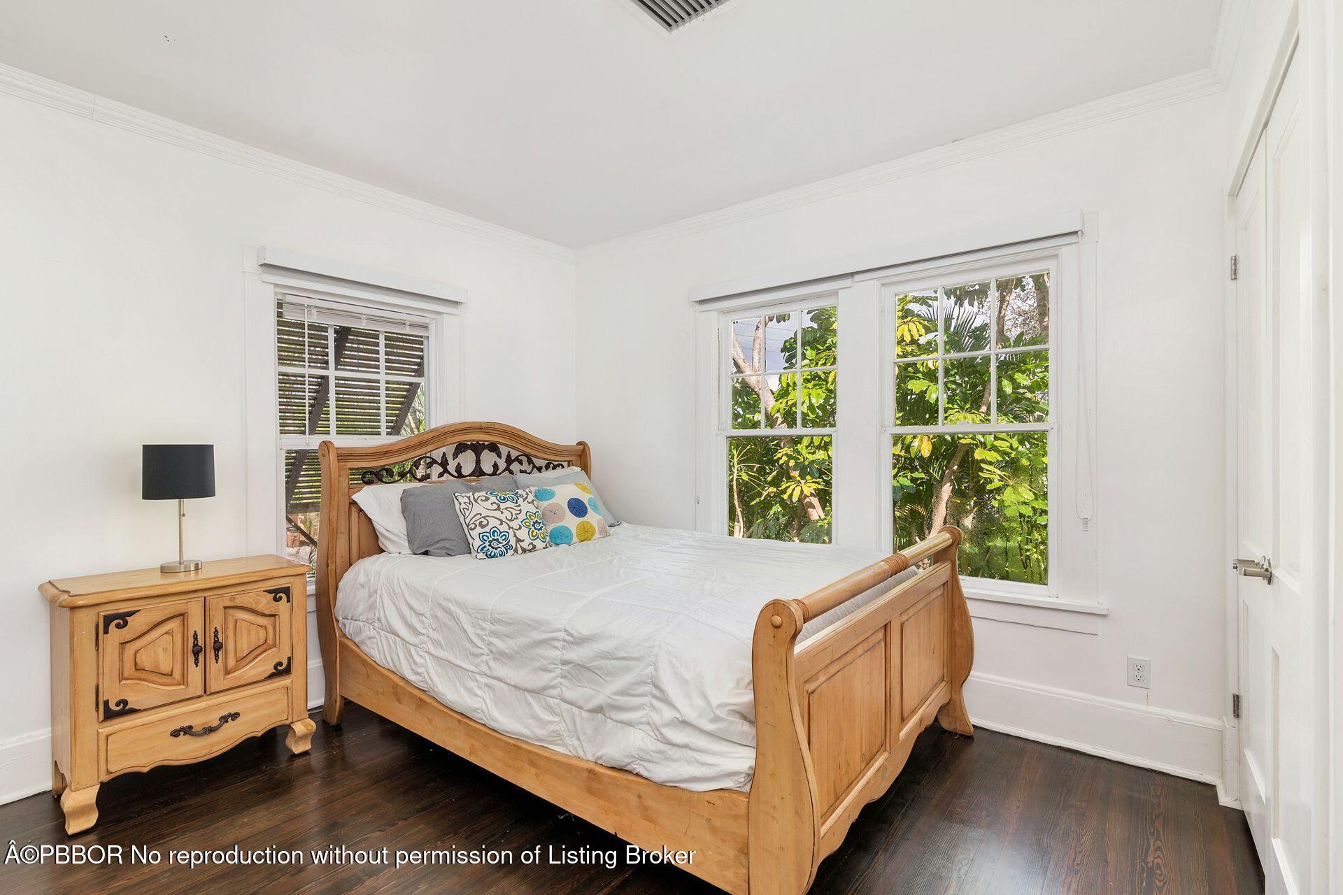 4112 Washington Road West Palm Beach, FL 33405 - Photo 20 of 41 a bedroom with a bed and a window