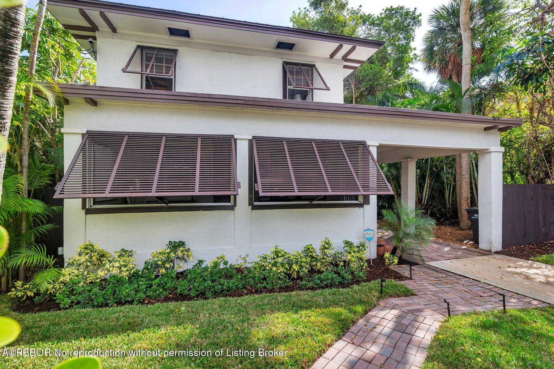 4112 Washington Road West Palm Beach, FL 33405 - Photo 2 of 41 a house view with a garden space