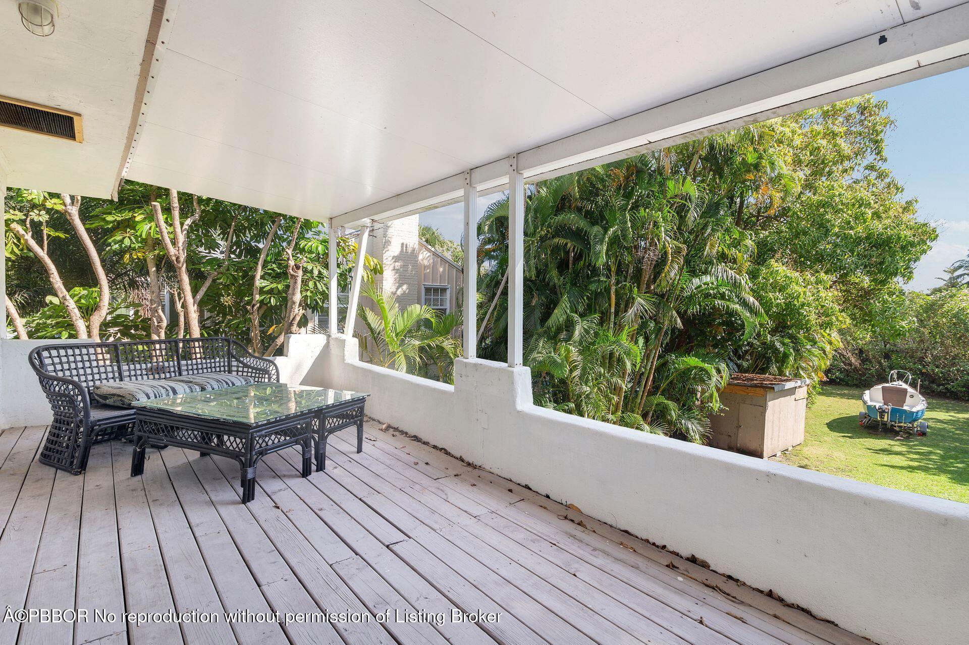 4112 Washington Road West Palm Beach, FL 33405 - Photo 23 of 41 a outdoor view with a sitting space