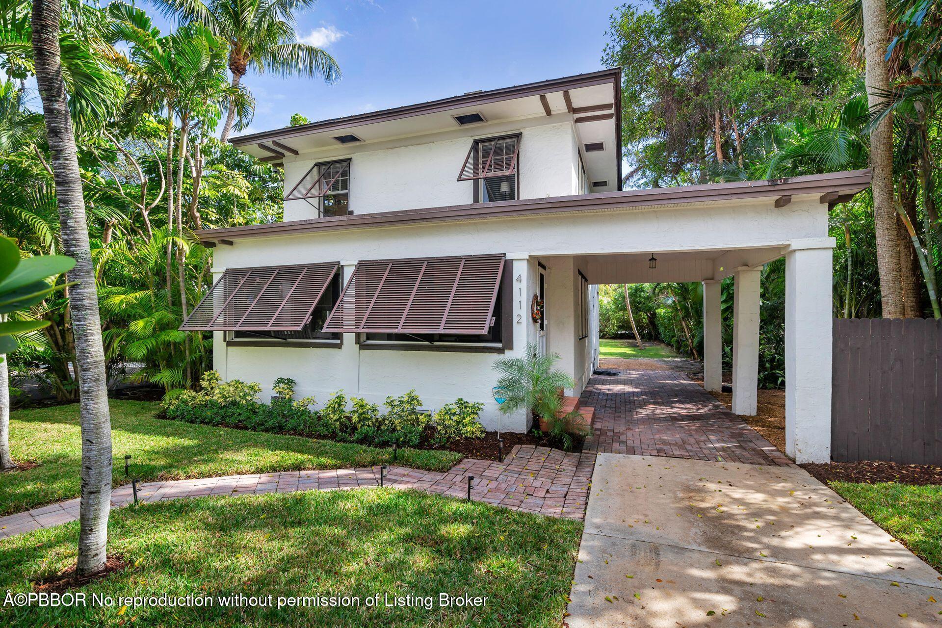 4112 Washington Road West Palm Beach, FL 33405 - Photo 34 of 41 a view of a house with backyard