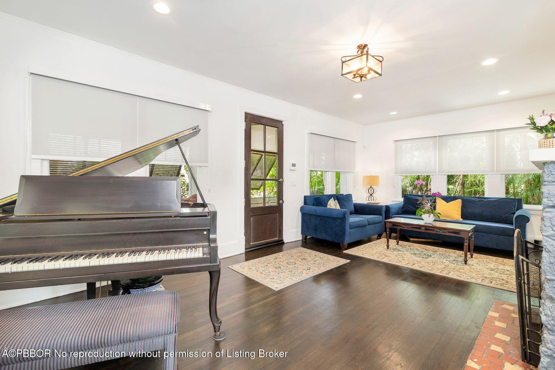 4112 Washington Road West Palm Beach, FL 33405 - Photo 7 of 41 a living room with furniture and wooden floor