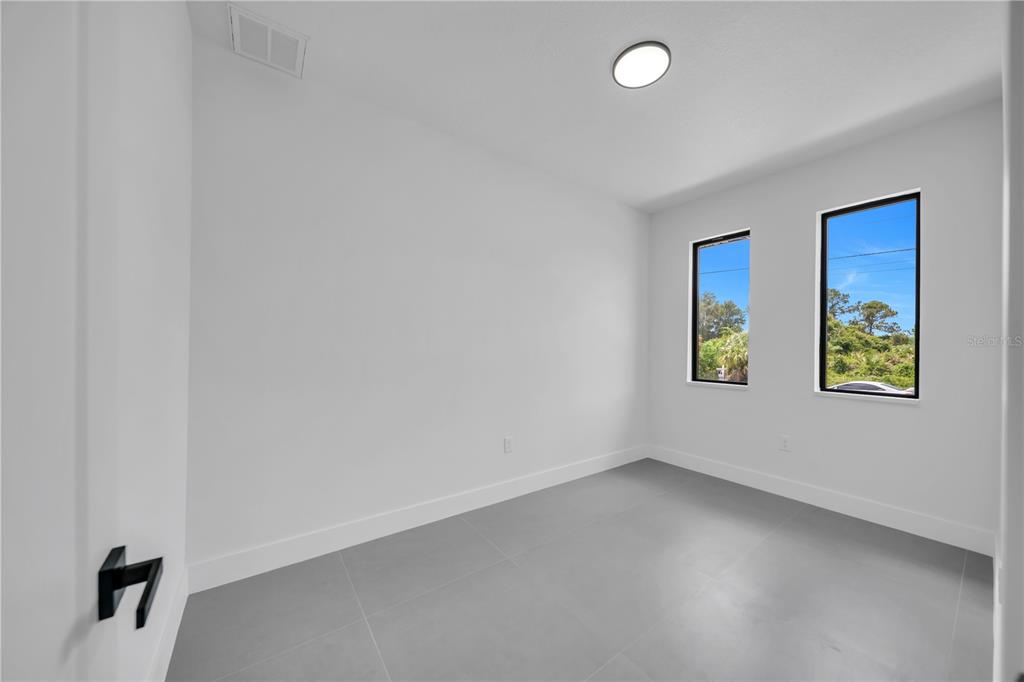 2328 Irondale Road North Port, FL 34287 - Photo 8 of 45 a view of room with window