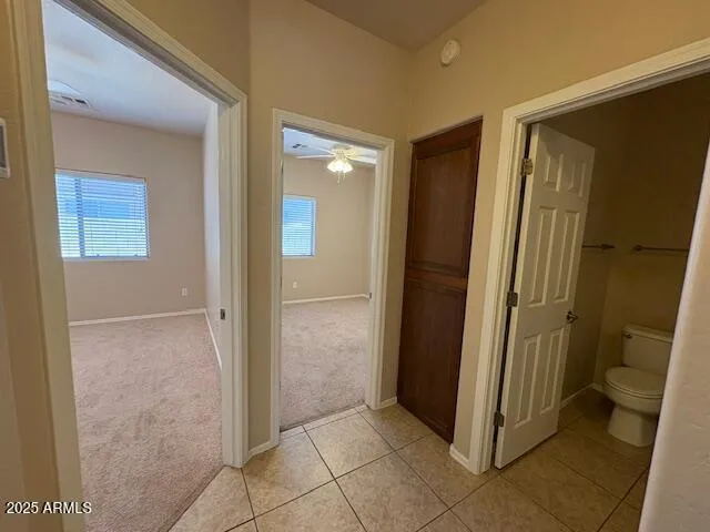 a view of a bathroom with a glass door and a shower