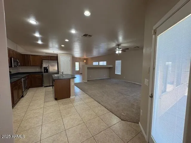 a view of a kitchen with a sink