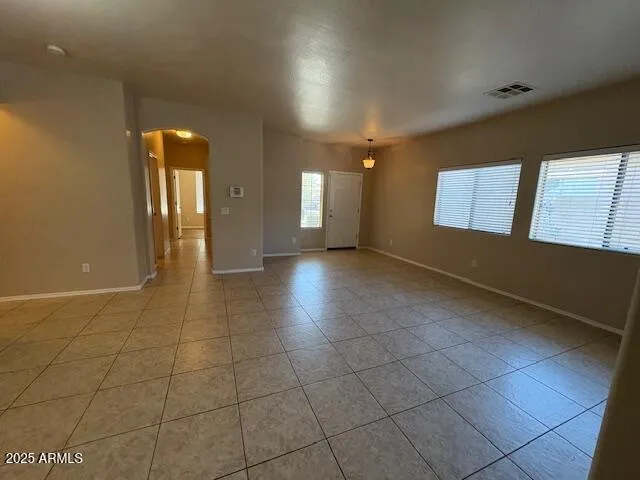 a view of hallway with a large window