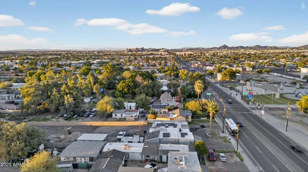 an aerial view of a city with lots of residential buildings